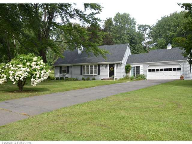 14 Castlewood Road Simsbury, CT 06089 - Photo 1 of 1 a front view of a house with a garden