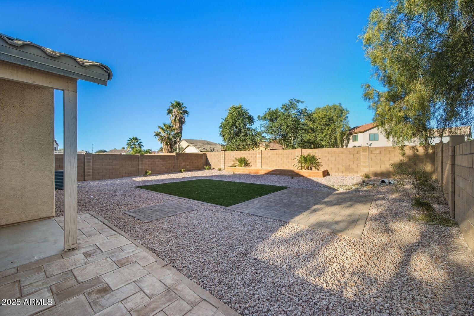 4128 East Copper Road San Tan Valley, AZ 85143 - Photo 25 of 27 a view of a house with a yard