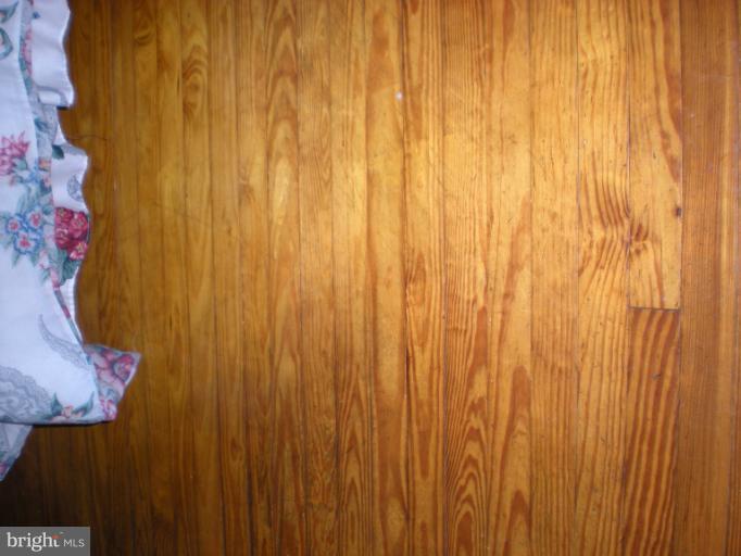 10701 Green Valley Road Union Bridge, MD 21791 - Photo 13 of 14 Stained oak flooring in living room
