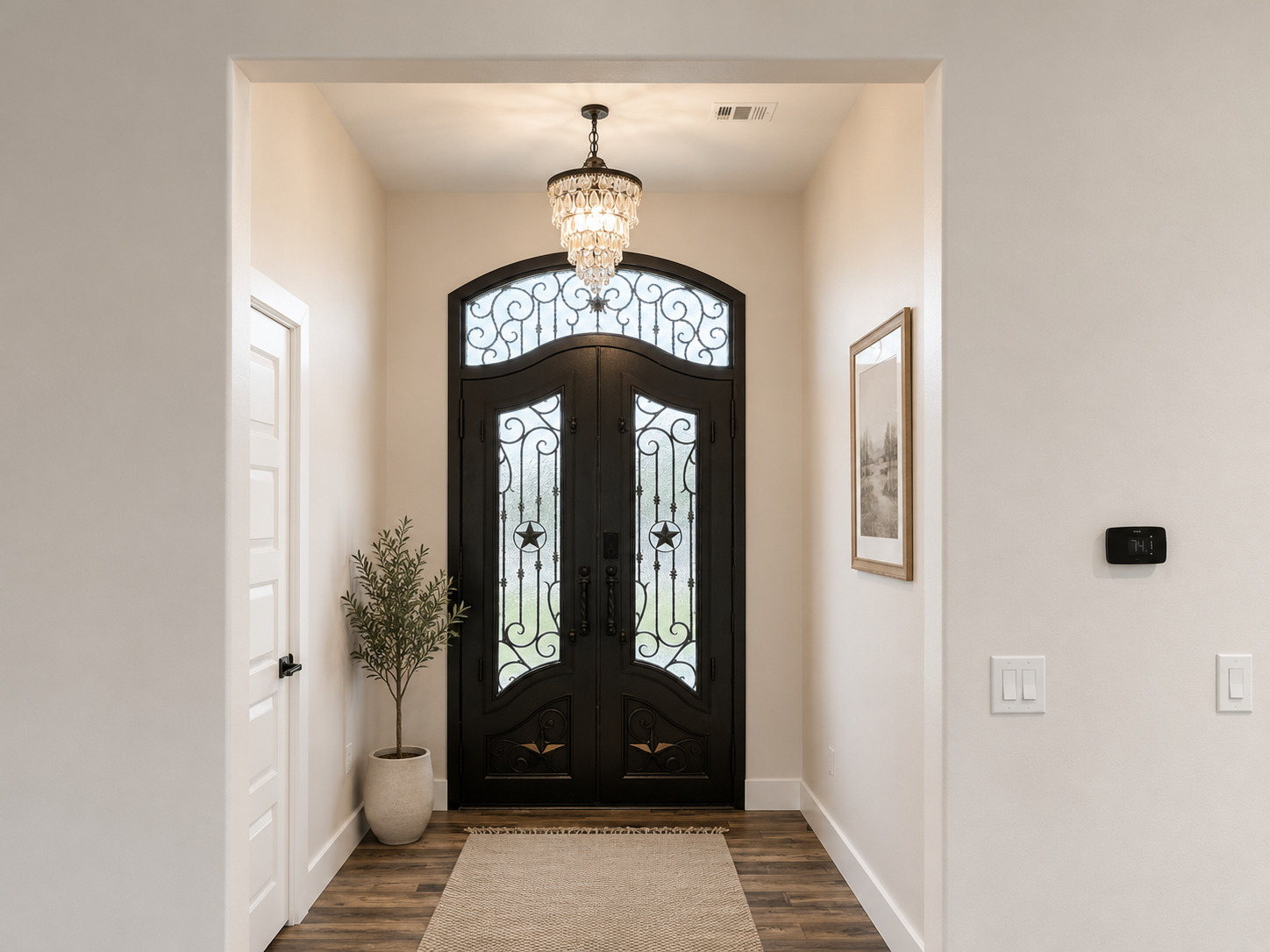 488 County Road 468 Elgin, TX 78621 - Photo 2 of 12 Ornate wrought iron entry doors welcome you into this inviting home.