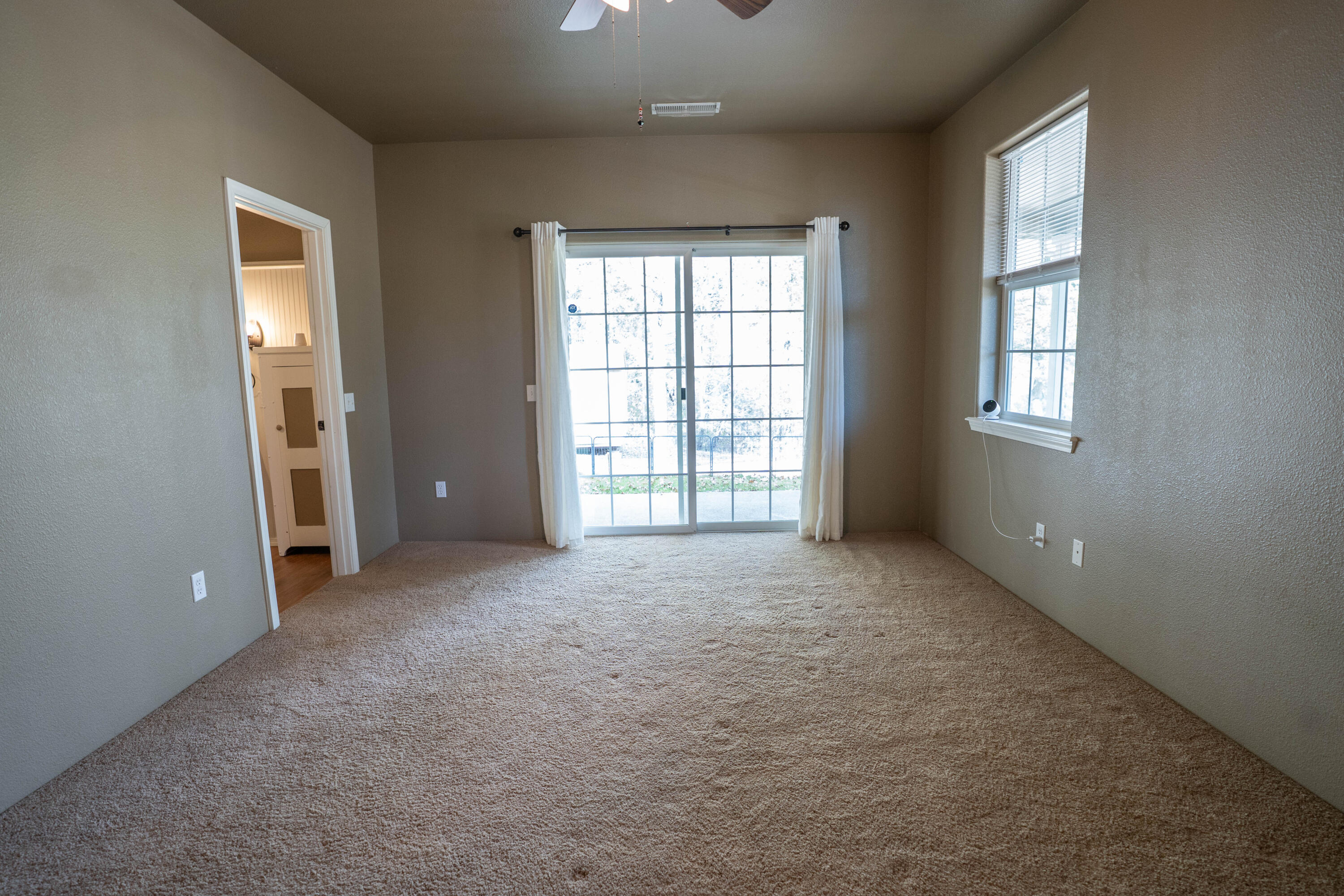 2080 Swingle Road Trail, OR 97541 - Photo 8 of 52 Primary suite with private patio access.