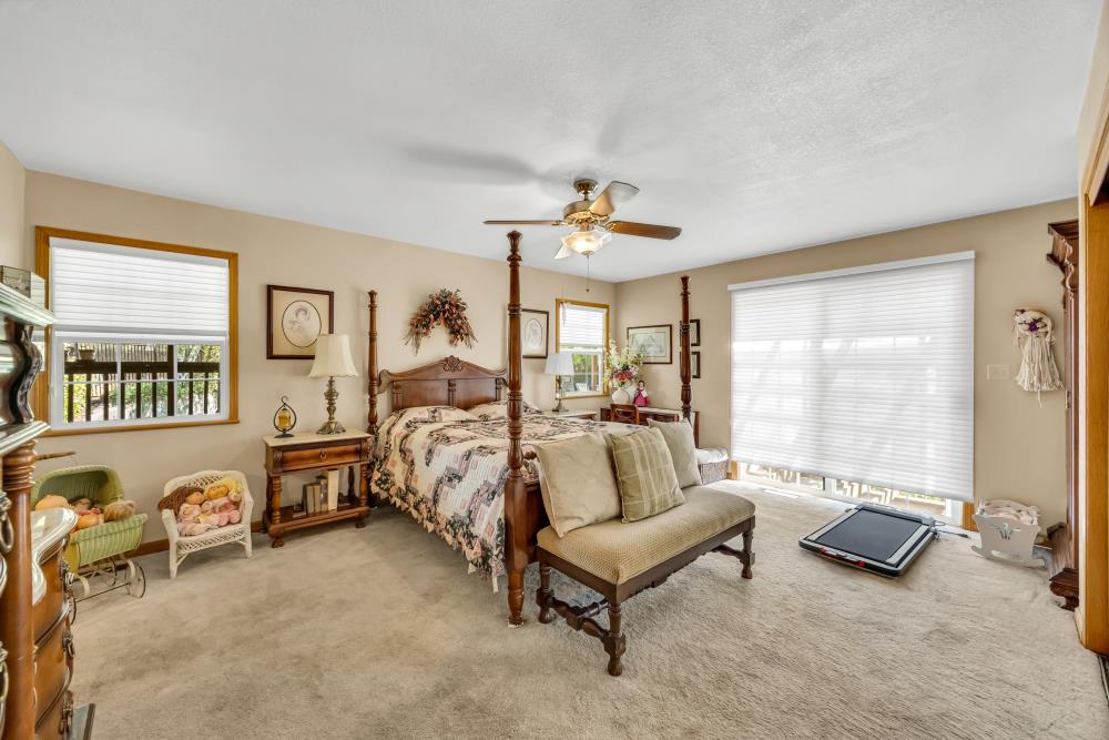 6400 State Highway Lotus, CA 95651 - Photo 34 of 95 a spacious bedroom with furniture and a large window