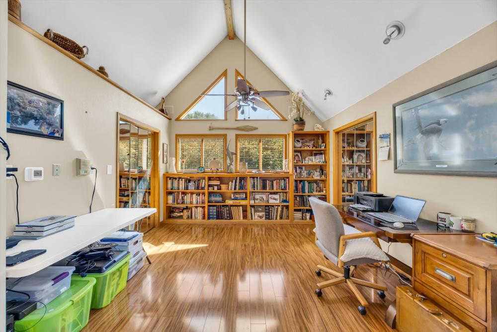 6400 State Highway Lotus, CA 95651 - Photo 42 of 95 a living room with furniture and a flat screen tv