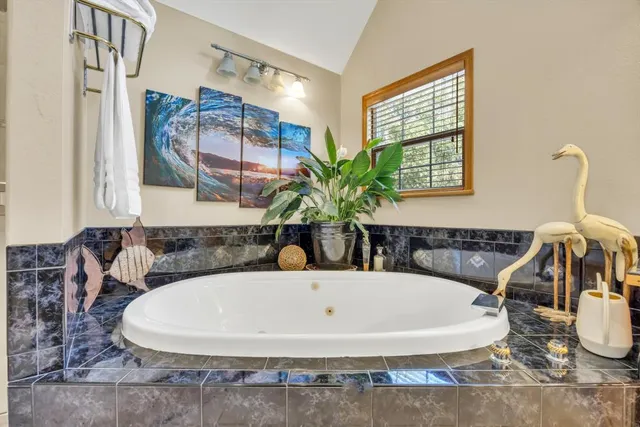 a view of street with large trees