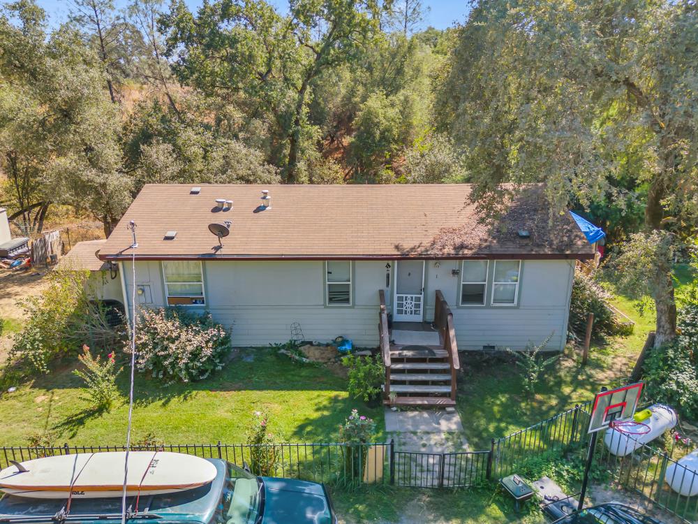 6400 State Highway Lotus, CA 95651 - Photo 61 of 95 an aerial view of a house with swimming pool garden and patio