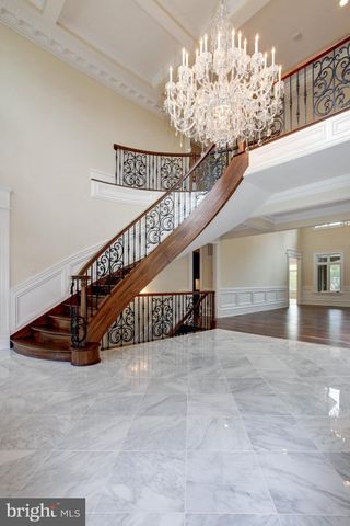 a kitchen with stainless steel appliances a sink dishwasher window and cabinets