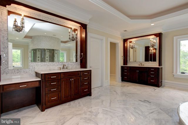 a view of an empty room with wooden walls