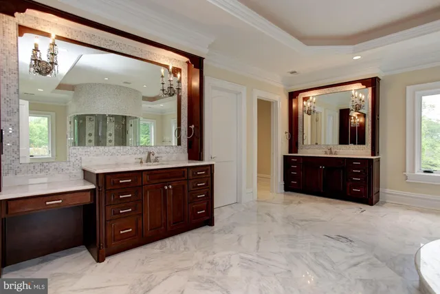 a view of an empty room with wooden walls