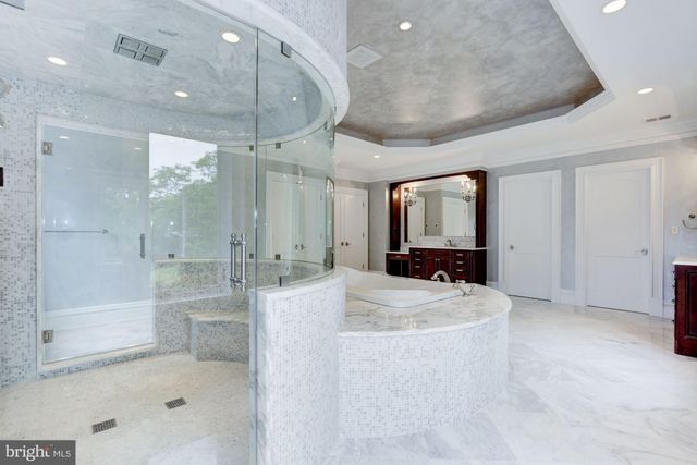 a front view of a house with swimming pool