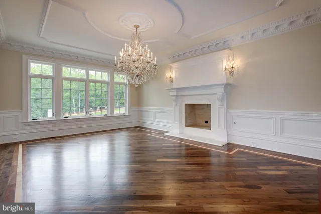 a kitchen with stainless steel appliances a sink and cabinets
