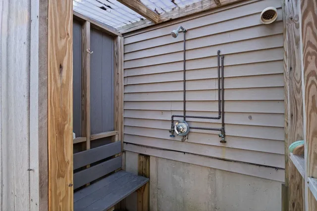 a view of a yard with large trees