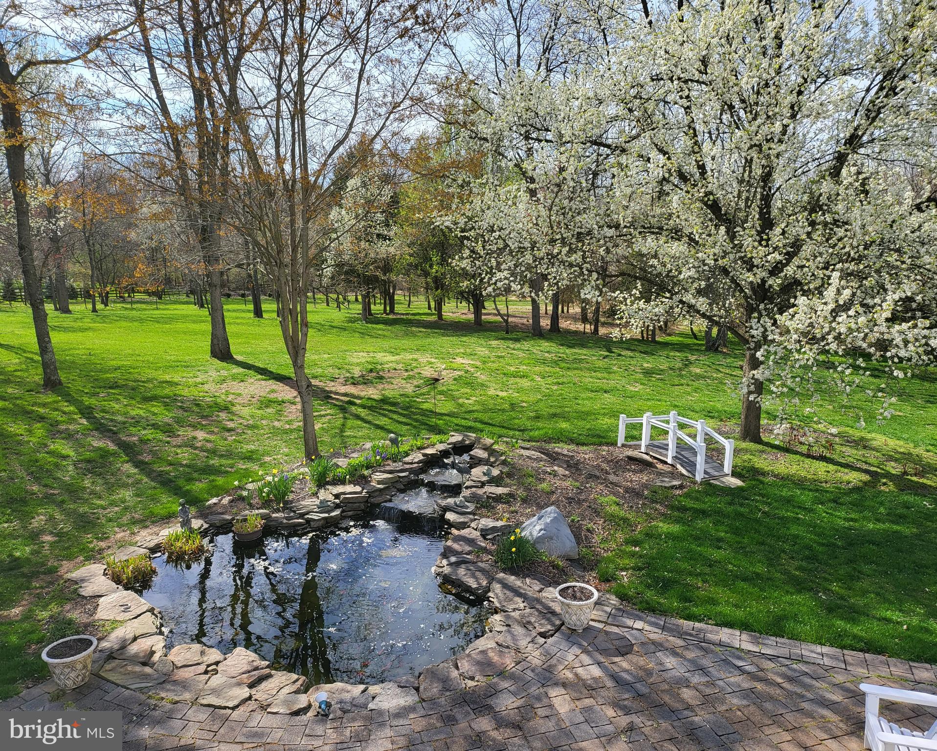 21632 Ripplemead Drive Laytonsville, MD 20882 - Photo 72 of 136 View of paver Patio from the Deck