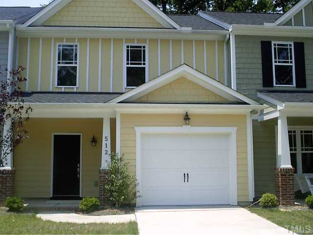 510 Cardamon Court Raleigh, NC 27610 - Photo 3 of 5 a front view of a house with garden