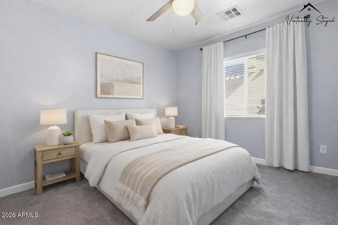 1707 West Harding Avenue Coolidge, AZ 85128 - Photo 19 of 53 a bedroom with a bed and a window