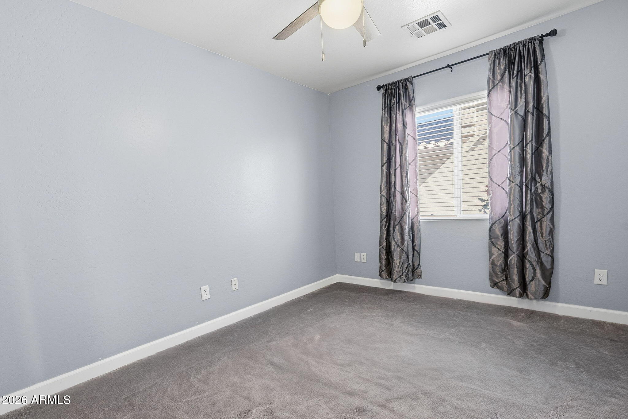 1707 West Harding Avenue Coolidge, AZ 85128 - Photo 20 of 53 an empty room with windows