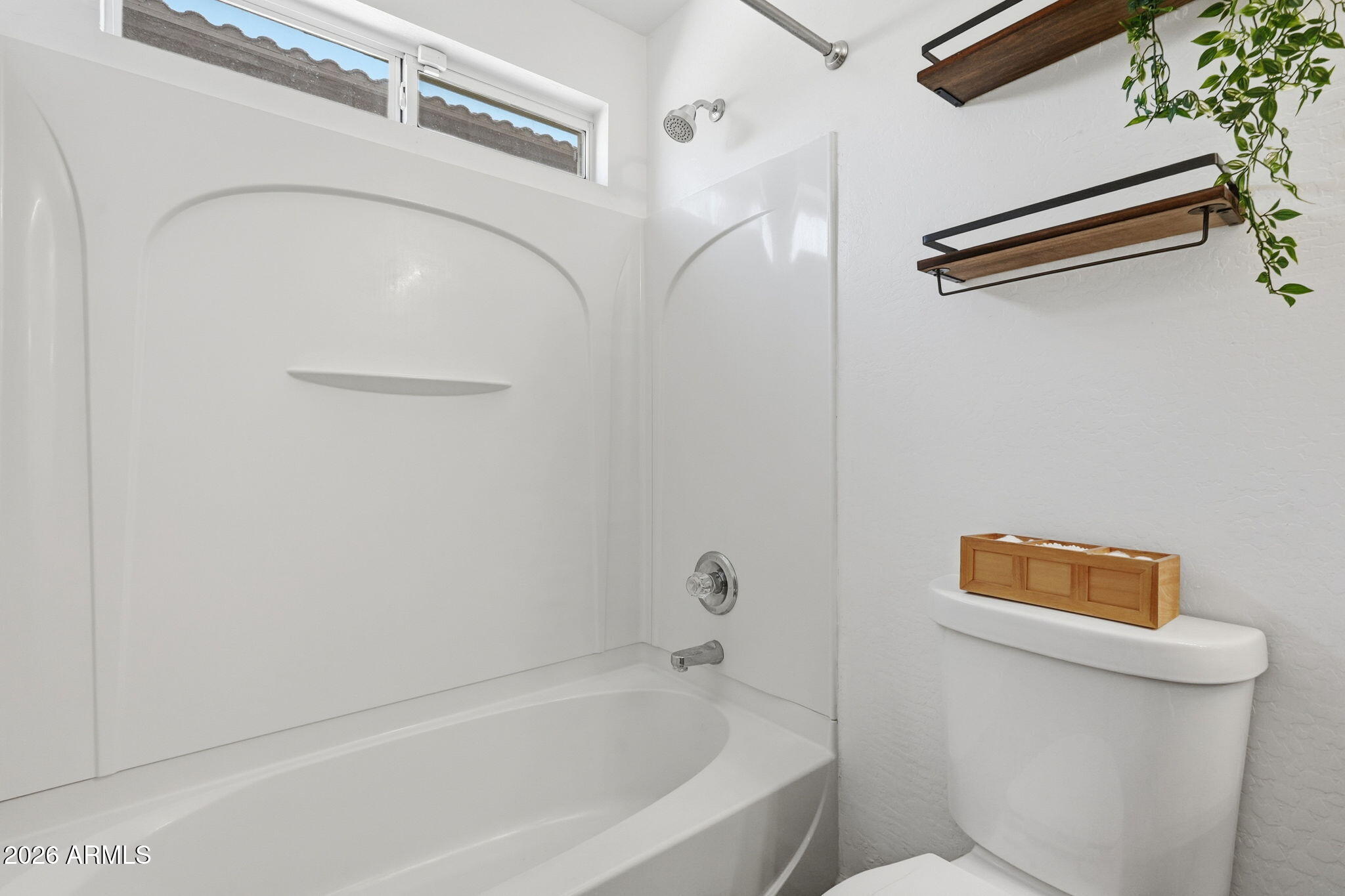 1707 West Harding Avenue Coolidge, AZ 85128 - Photo 22 of 53 a bathroom with a shower and a toilet