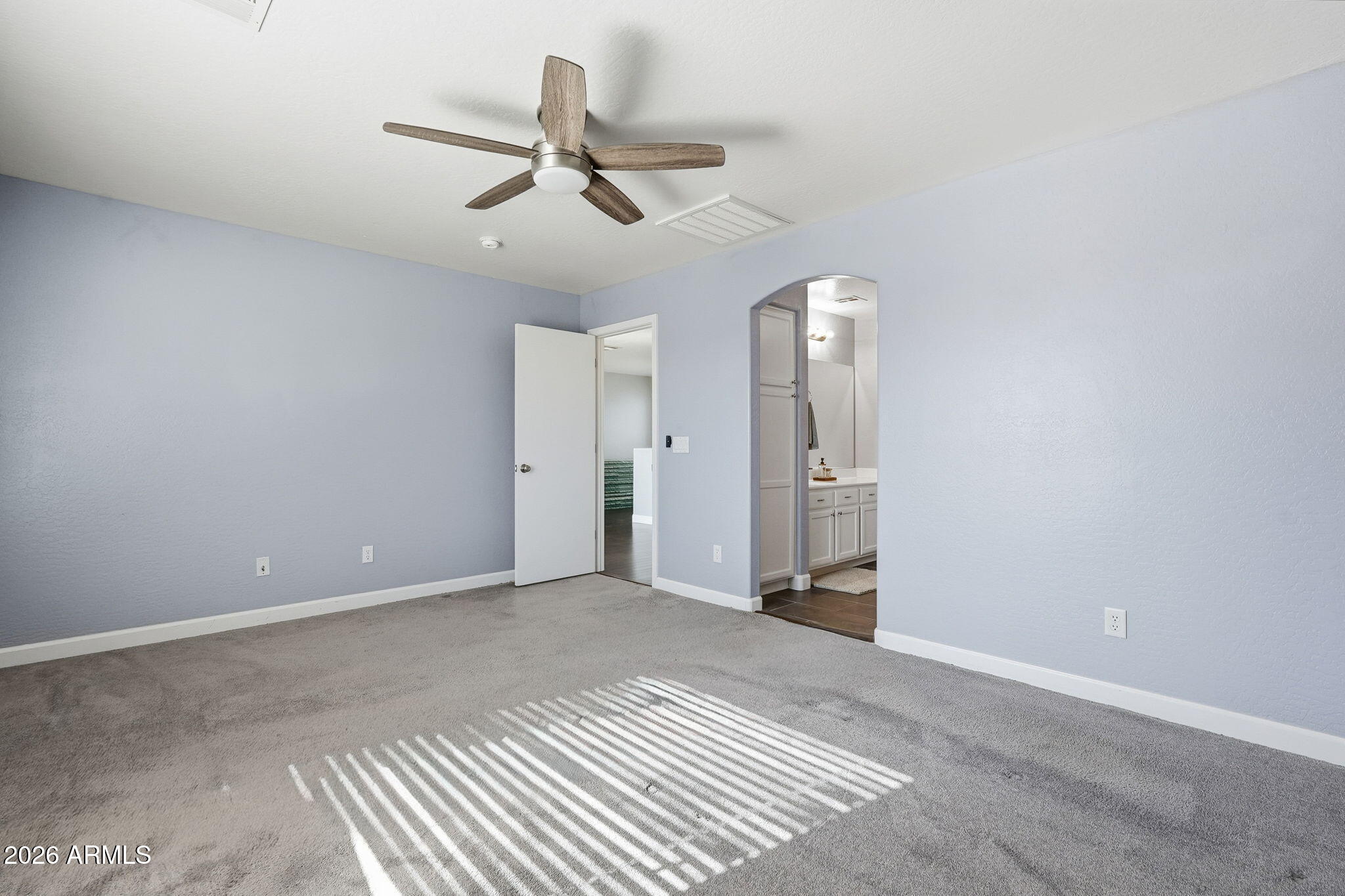 1707 West Harding Avenue Coolidge, AZ 85128 - Photo 30 of 53 a view of a livingroom with a ceiling fan and window