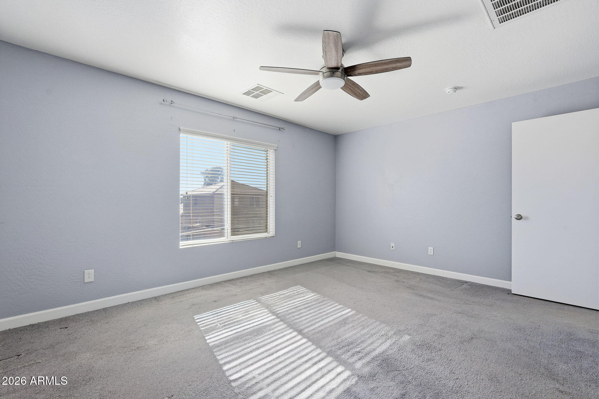 1707 West Harding Avenue Coolidge, AZ 85128 - Photo 31 of 53 a view of an empty room with a window