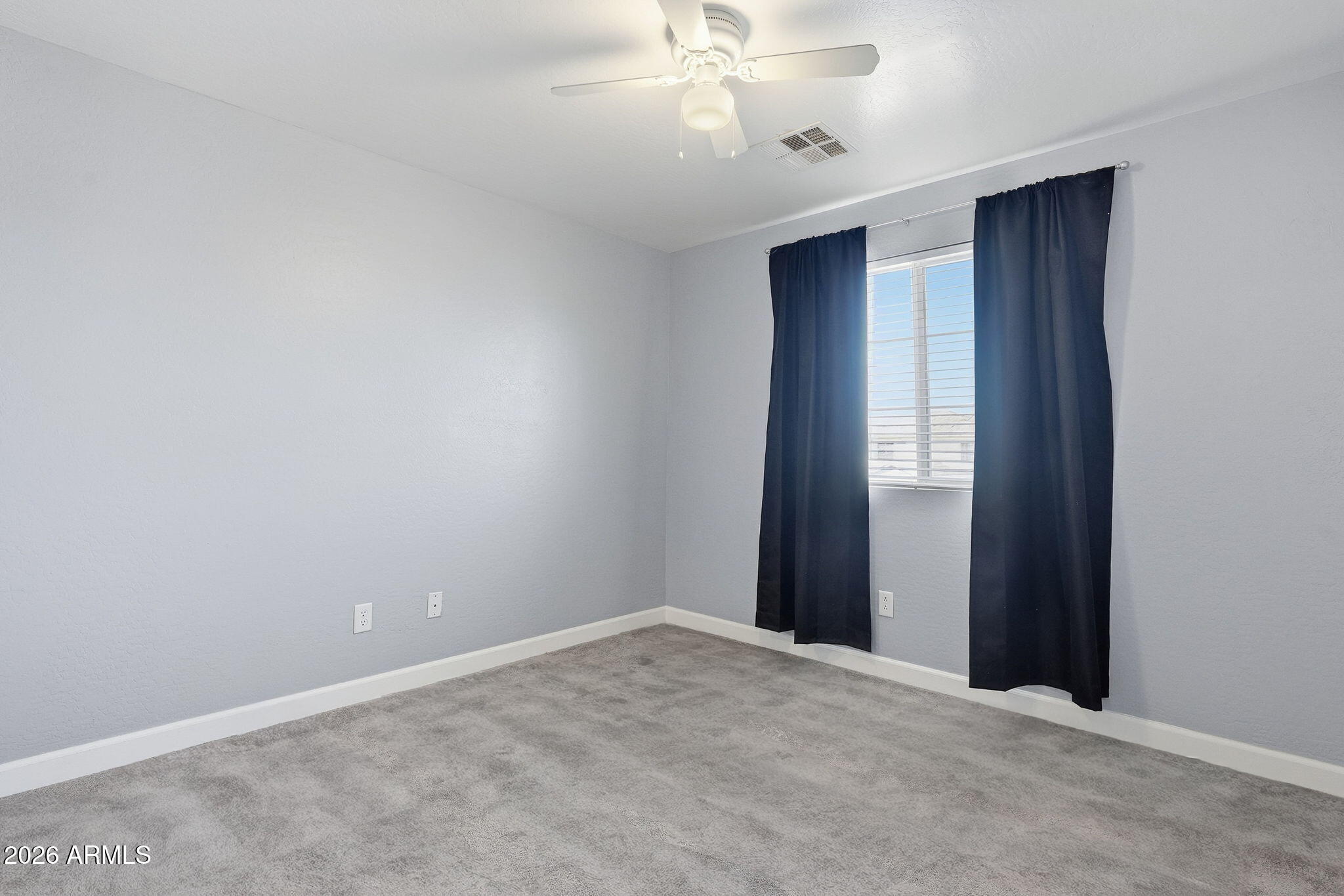 1707 West Harding Avenue Coolidge, AZ 85128 - Photo 39 of 53 a view of an empty room with a window