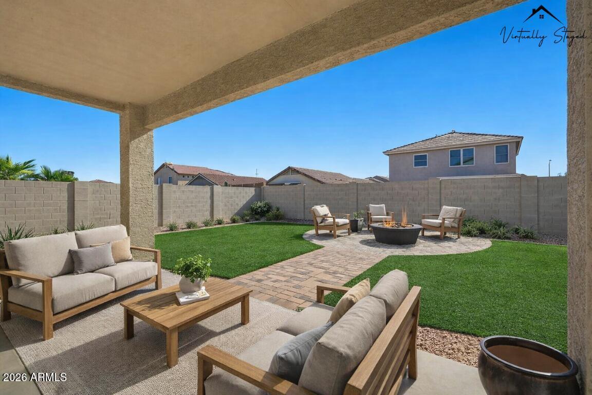 1707 West Harding Avenue Coolidge, AZ 85128 - Photo 46 of 53 a view of a backyard with furniture porch and a garden