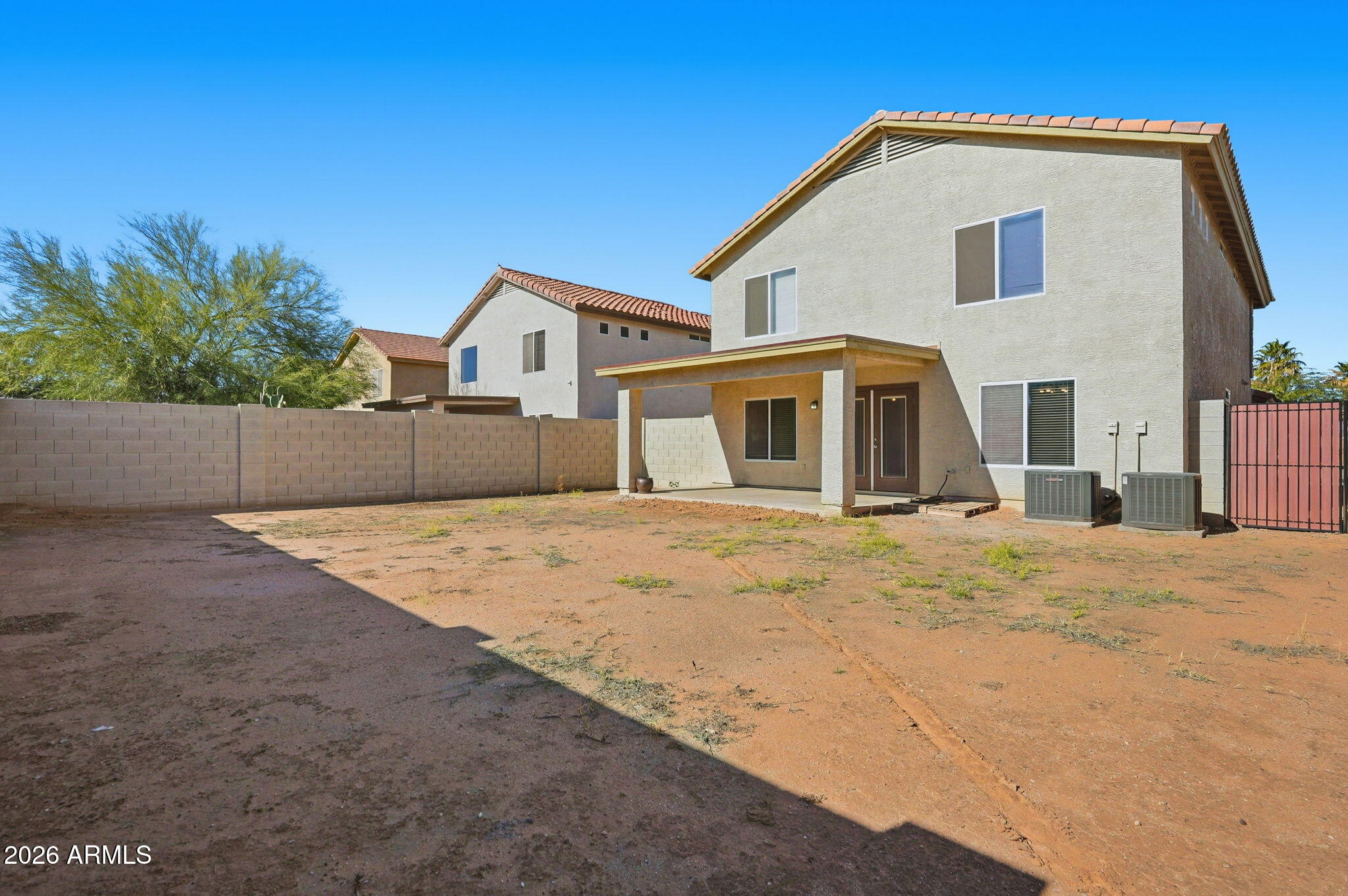 1707 West Harding Avenue Coolidge, AZ 85128 - Photo 51 of 53 a front view of a house with a yard