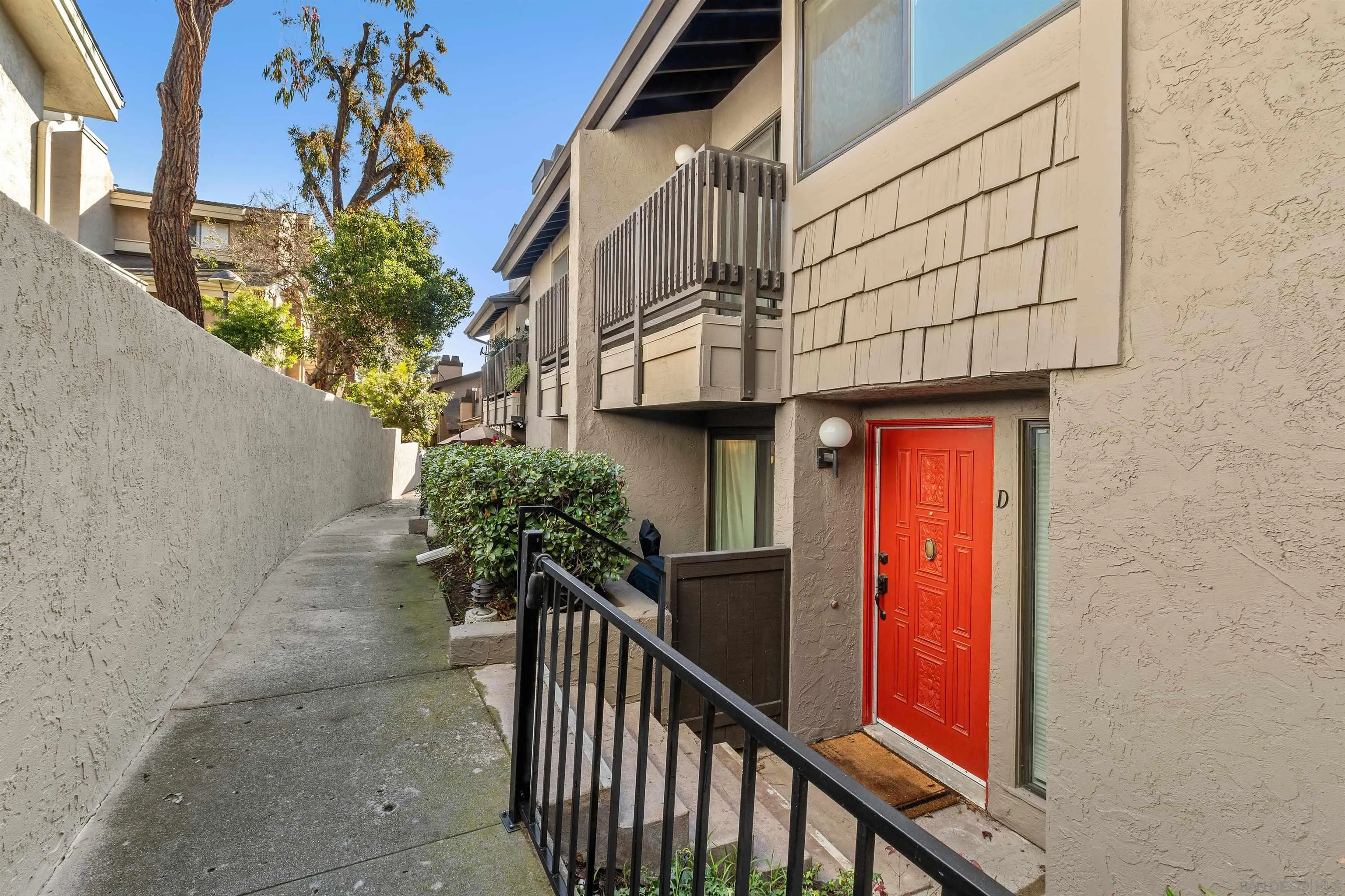 8366 Via Sonoma, Unit D La Jolla, CA 92037 - Photo 32 of 43 a view of a house with a street