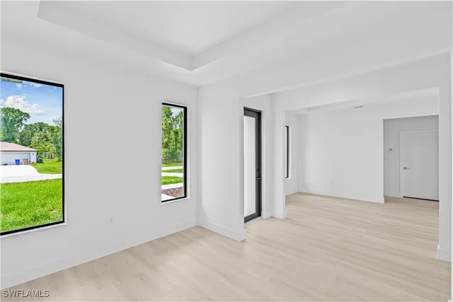 an empty room with windows