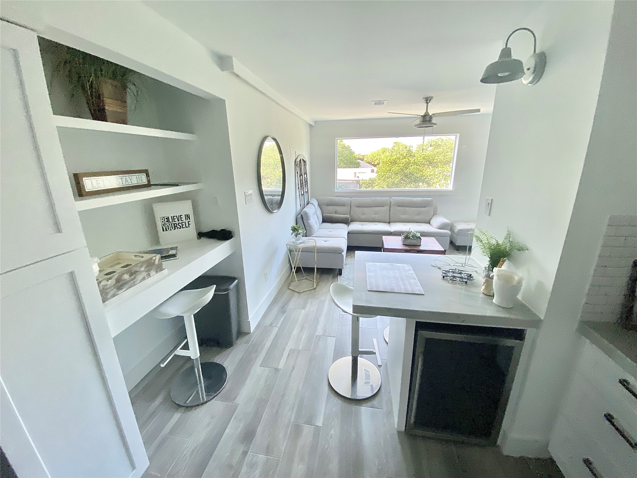 a living room with a couch and a table
