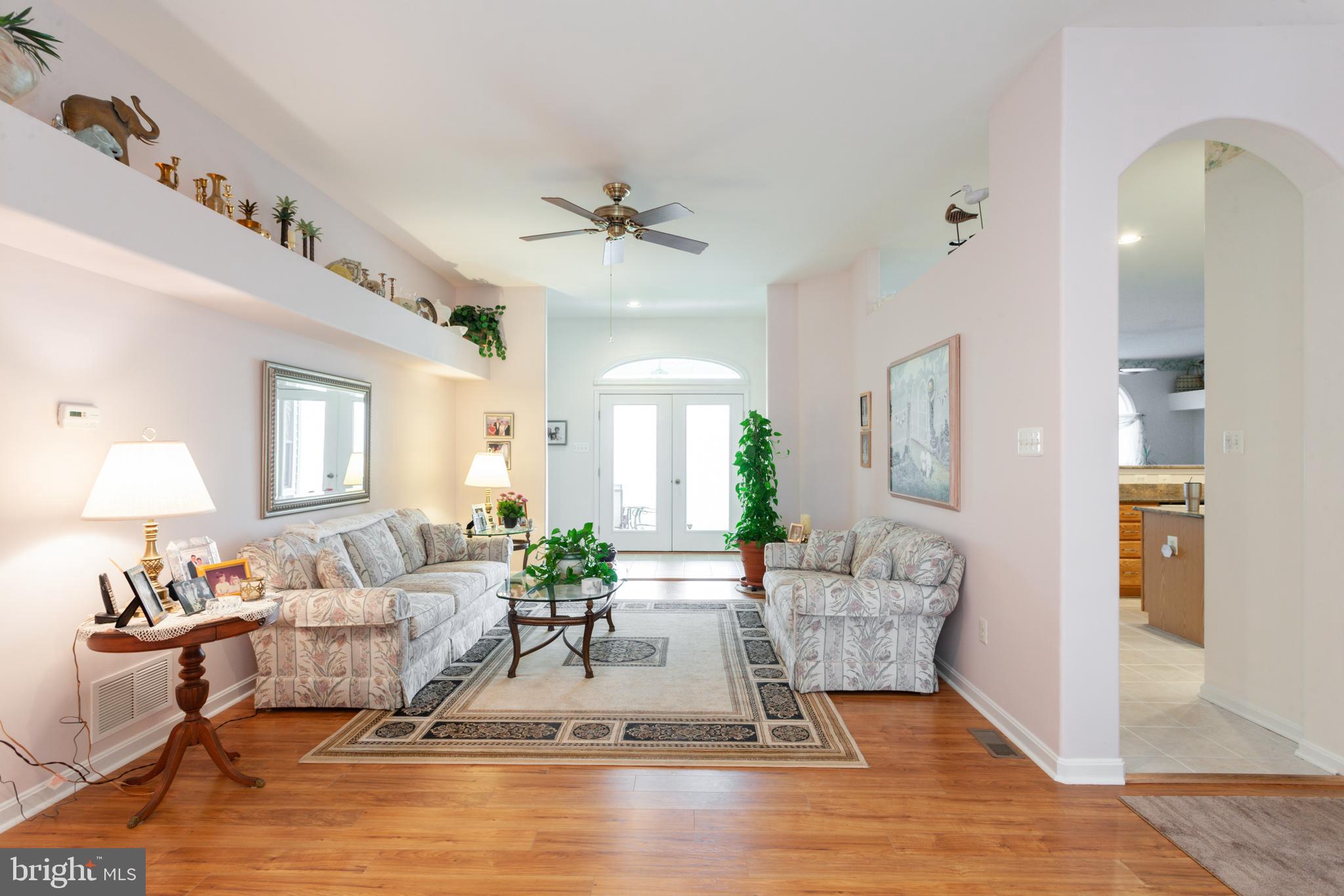 111 Weaver Meadows Road Conowingo, MD 21918 - Photo 21 of 51 Living room with custom shelving