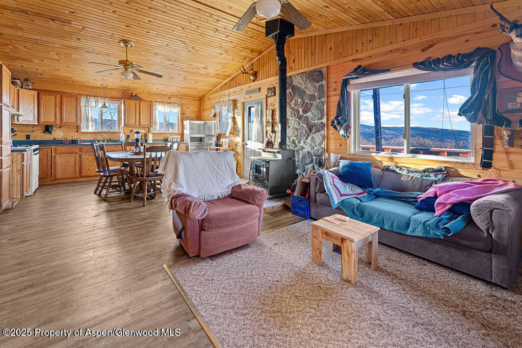 228 Eagle Loop Craig, CO 81625 - Photo 21 of 37 a living room with furniture and a large window