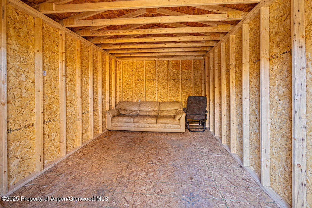228 Eagle Loop Craig, CO 81625 - Photo 34 of 37 a view of a room with a bed and a chair