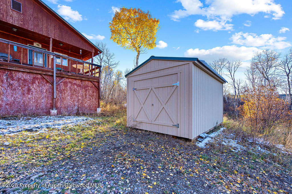 228 Eagle Loop Craig, CO 81625 - Photo 35 of 37 a house view with a backyard space