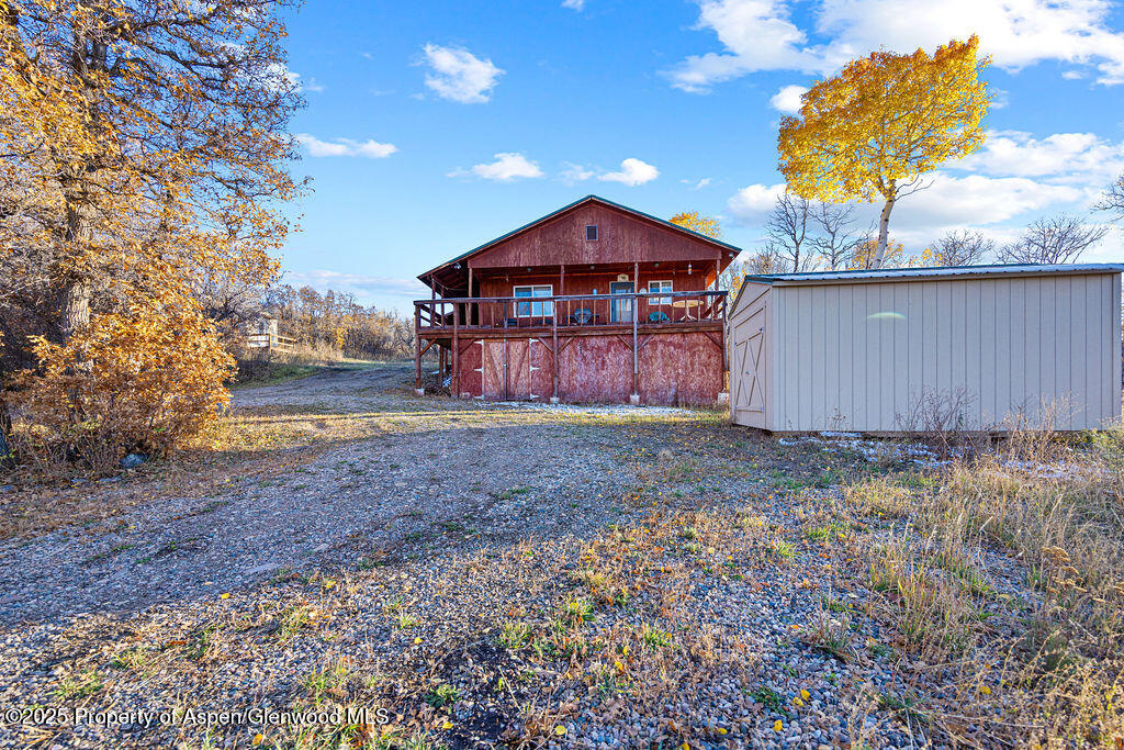 228 Eagle Loop Craig, CO 81625 - Photo 36 of 37 a view of a house with a yard