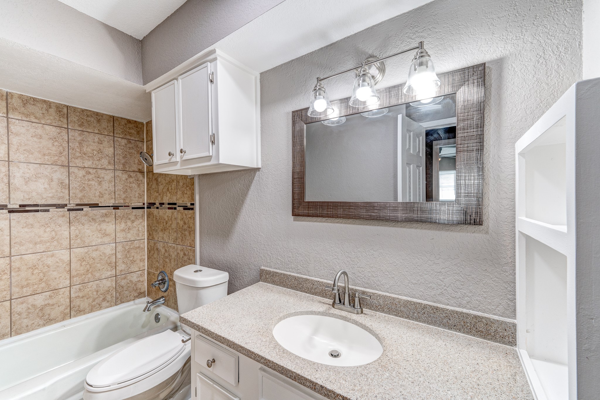 523 Spring Drive, Unit 4 Pasadena, TX 77504 - Photo 14 of 18 Updated bathroom