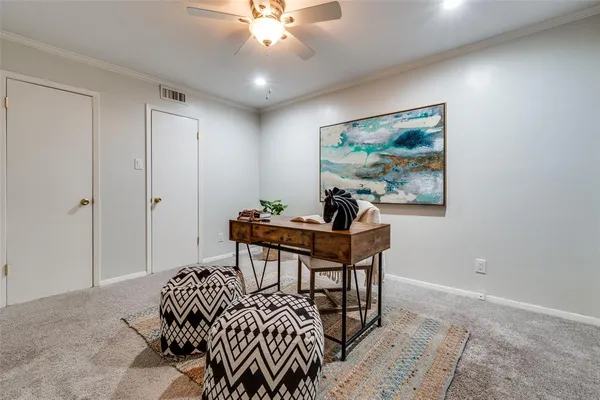 a bedroom with furniture and a chandelier