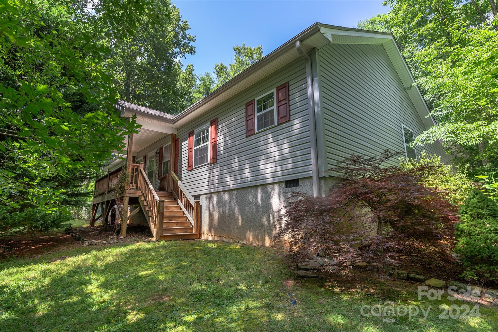 488 Anders Road Zirconia, NC 28790 - Photo 1 of 48 a view of a house with a yard