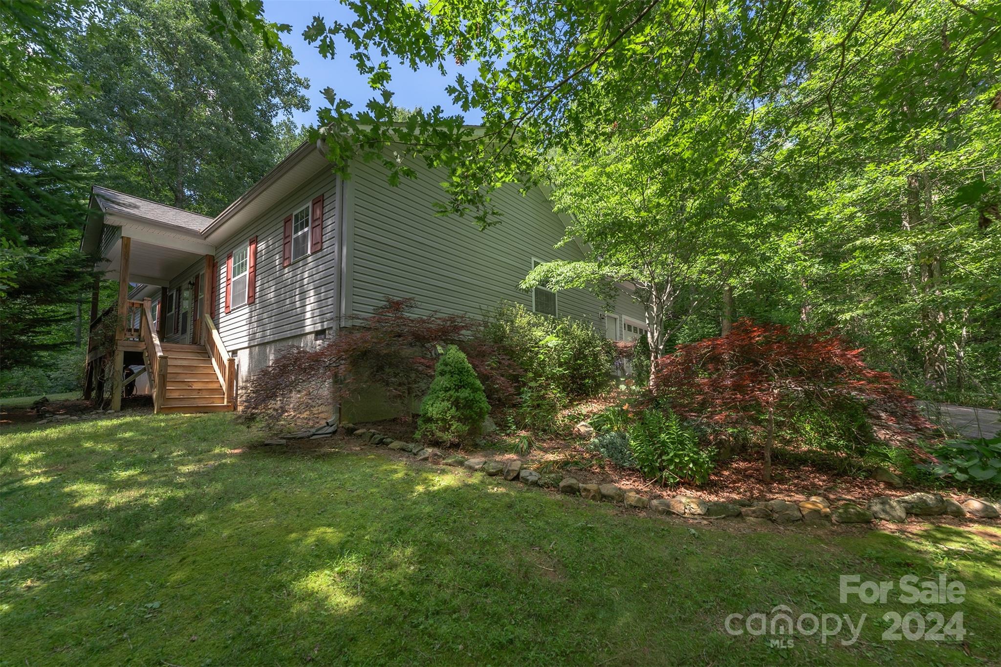 488 Anders Road Zirconia, NC 28790 - Photo 2 of 48 a view of a house with a yard