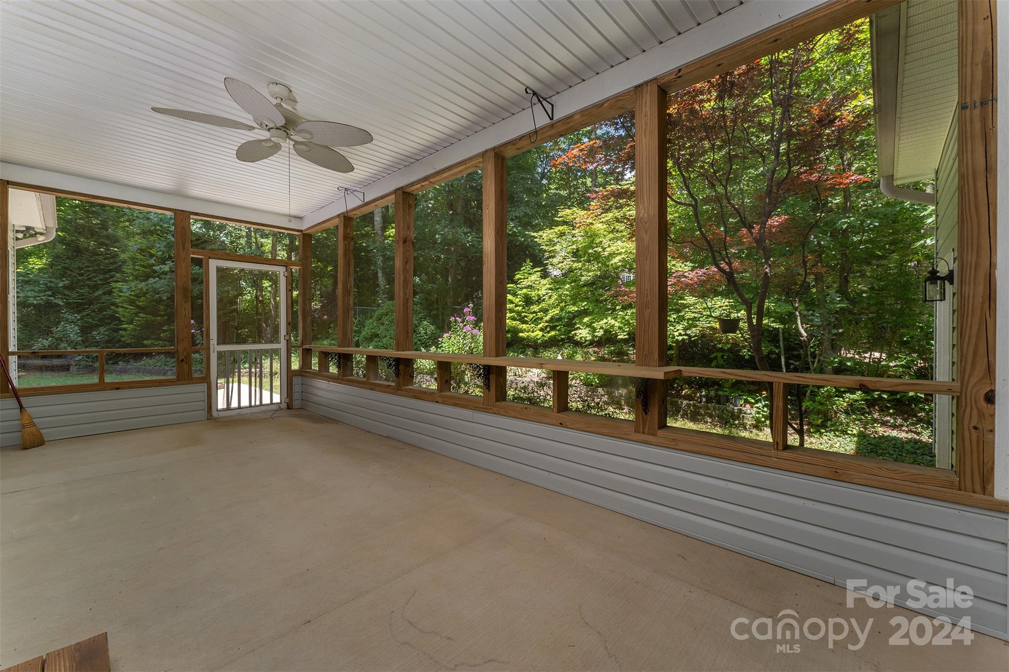 488 Anders Road Zirconia, NC 28790 - Photo 29 of 48 a view of a porch and garden