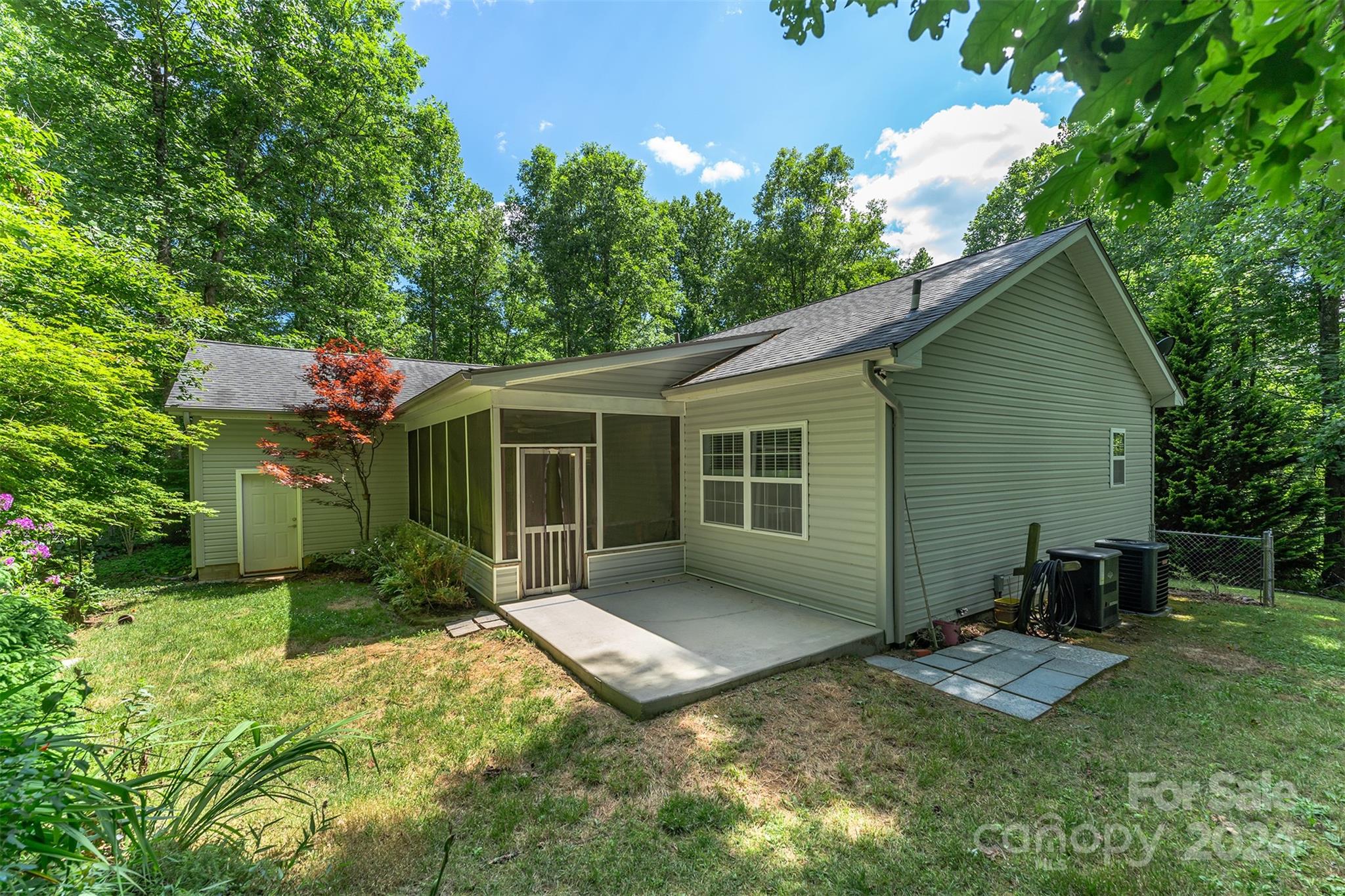 488 Anders Road Zirconia, NC 28790 - Photo 34 of 48 a view of a house with backyard