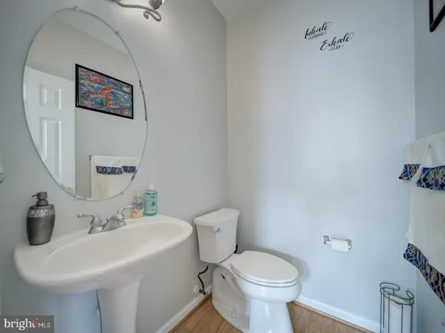 a en suite bathroom with a sink and a mirror