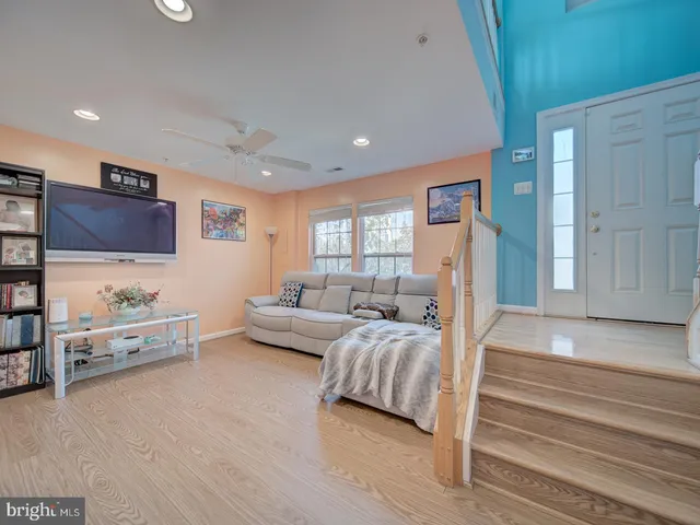 a living room with furniture and a couch