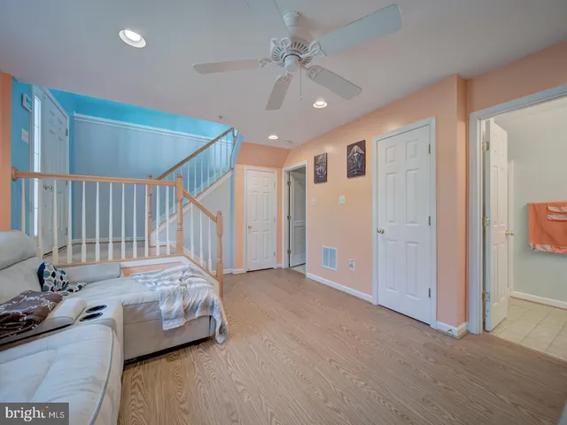 a bedroom with bed and window