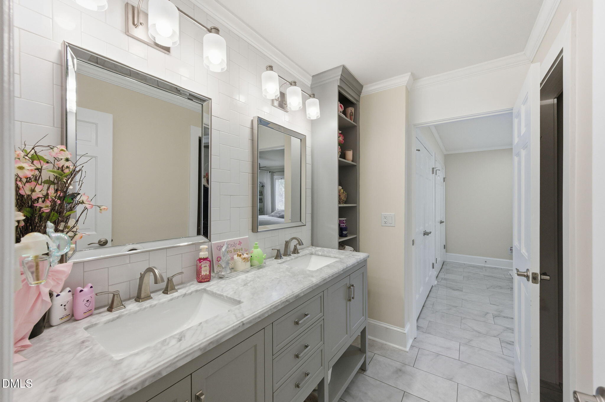 110 Circle Drive Spring Hope, NC 27882 - Photo 19 of 61 a bathroom with a double vanity sink and a mirror