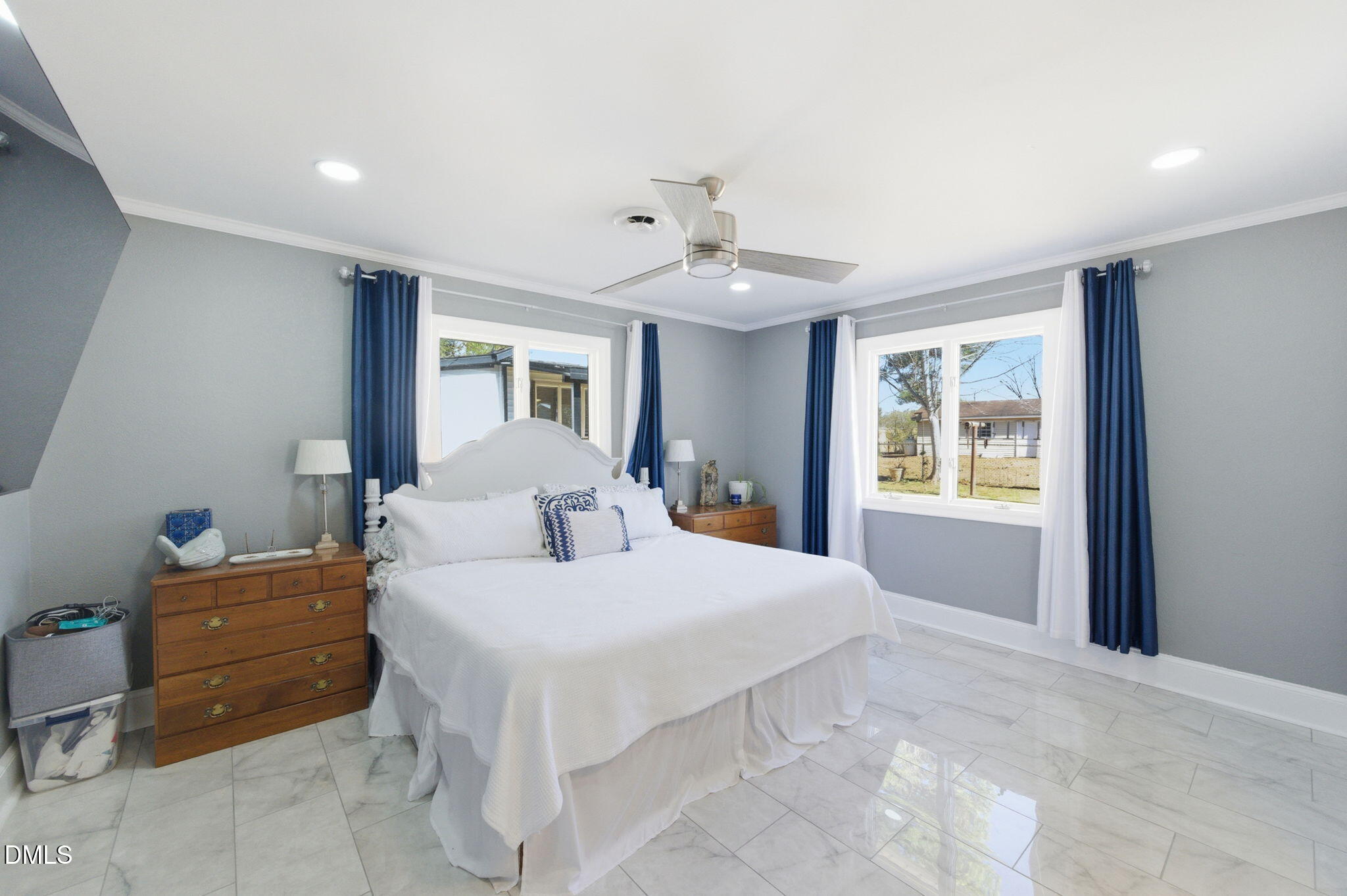 110 Circle Drive Spring Hope, NC 27882 - Photo 28 of 61 a bedroom with a bed and a window