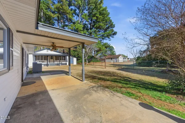a house view with a outdoor space