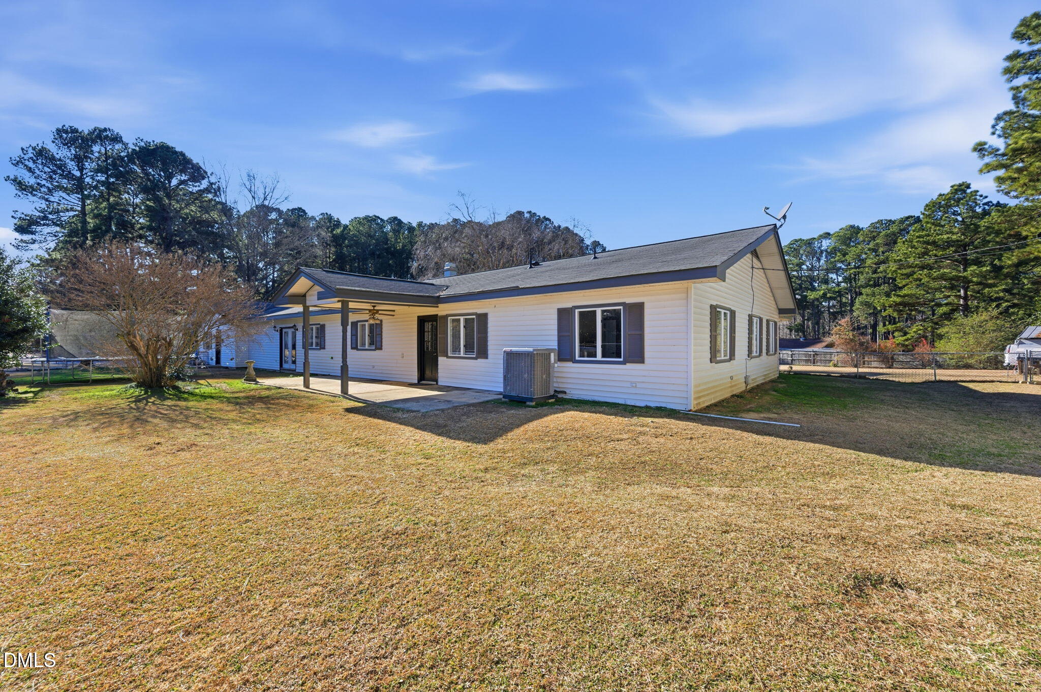 110 Circle Drive Spring Hope, NC 27882 - Photo 46 of 61 a swimming pool with outdoor seating and yard