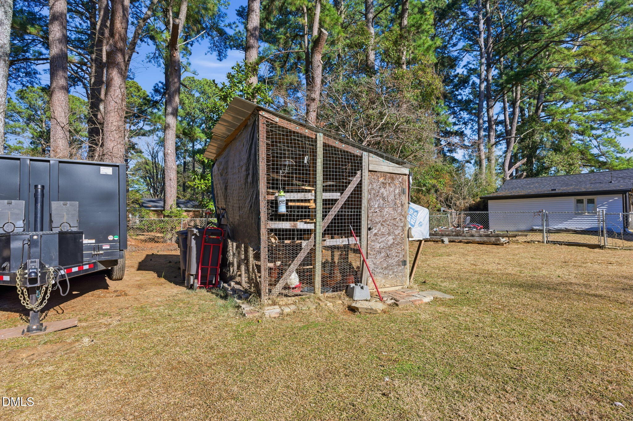 110 Circle Drive Spring Hope, NC 27882 - Photo 48 of 61 a view of a wooden house with a patio and a yard
