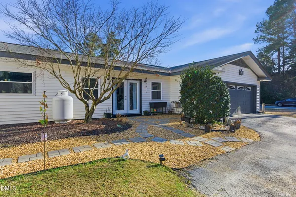 an aerial view of residential house with outdoor space