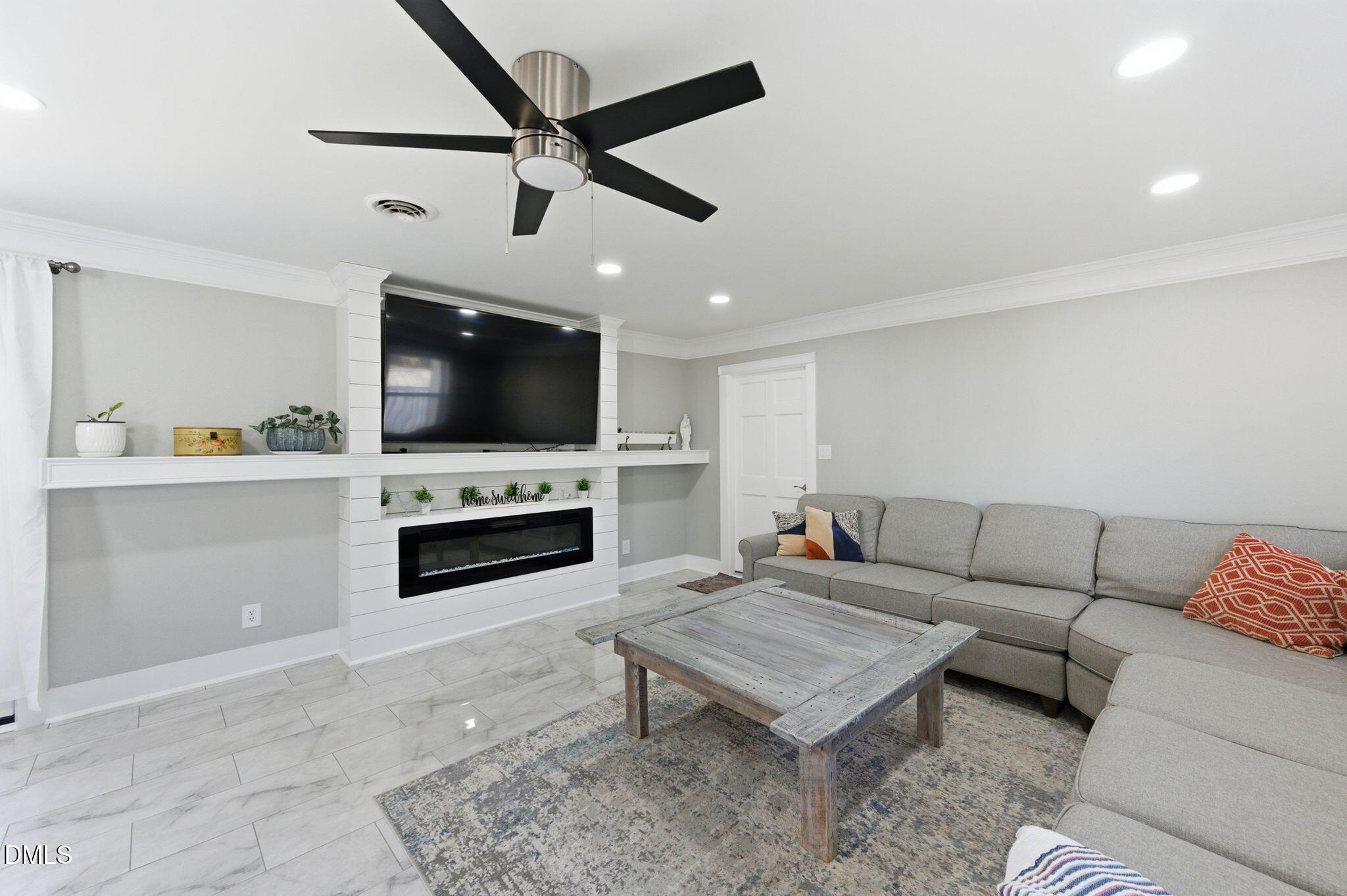 110 Circle Drive Spring Hope, NC 27882 - Photo 4 of 61 a living room with furniture and a fireplace