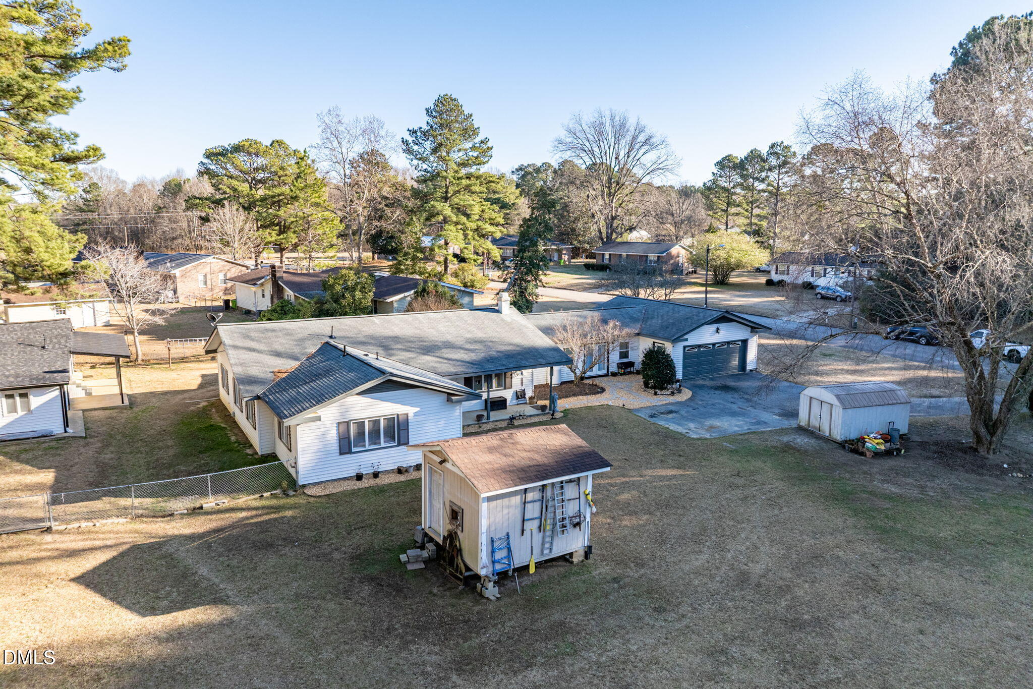110 Circle Drive Spring Hope, NC 27882 - Photo 55 of 61 a front view of a house with a yard and sitting area